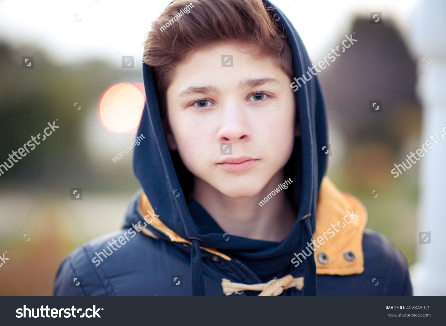 Blond Teenager Boy 14 15 Year Old Wearing Hoodie Outdoors Looking At Camera Blond Teenager Boy 14 15 Year Old Wearing Hoodie Outdoors Looking At Camera