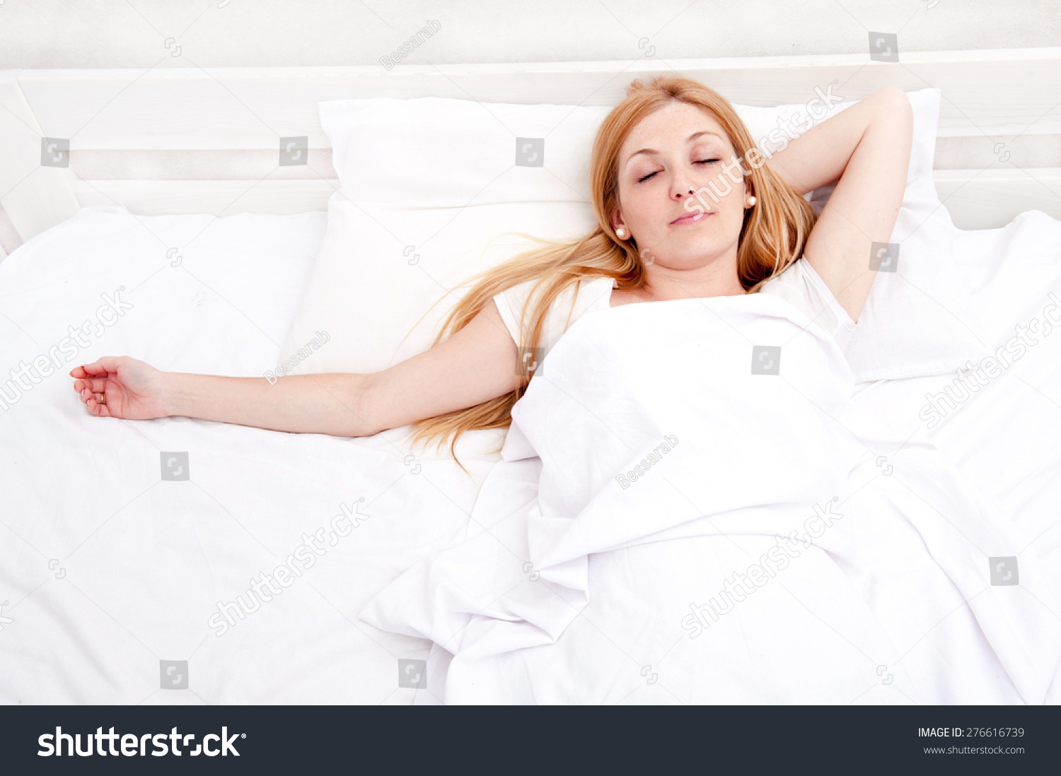 Blond Woman Sleeping In Bed Stock Photo 276616739 : Shutterstock