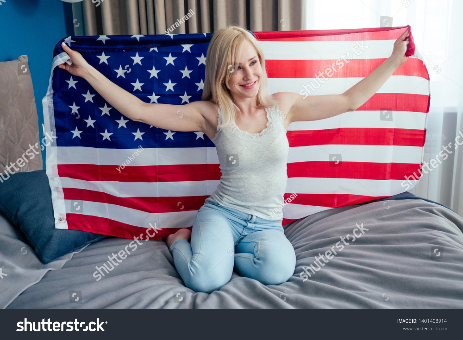 american flag over bed