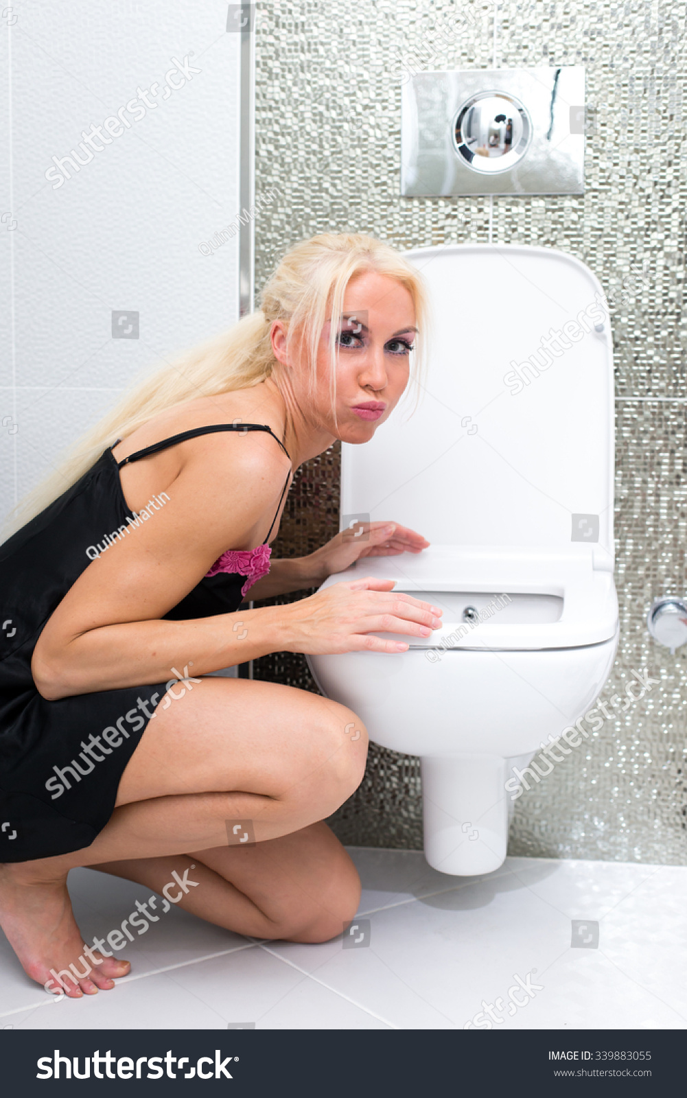 Blonde On Toilet