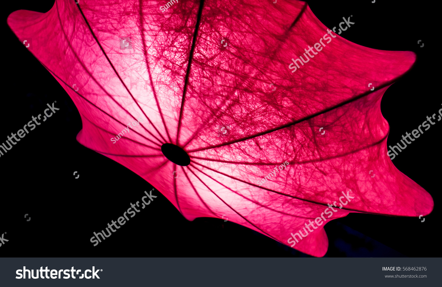 black umbrella with red inside