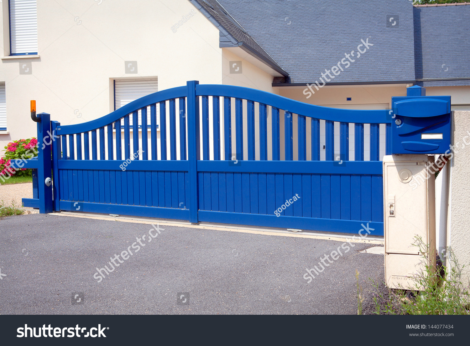 Blue gates new family house blue stock photo 144077434 shutterstock