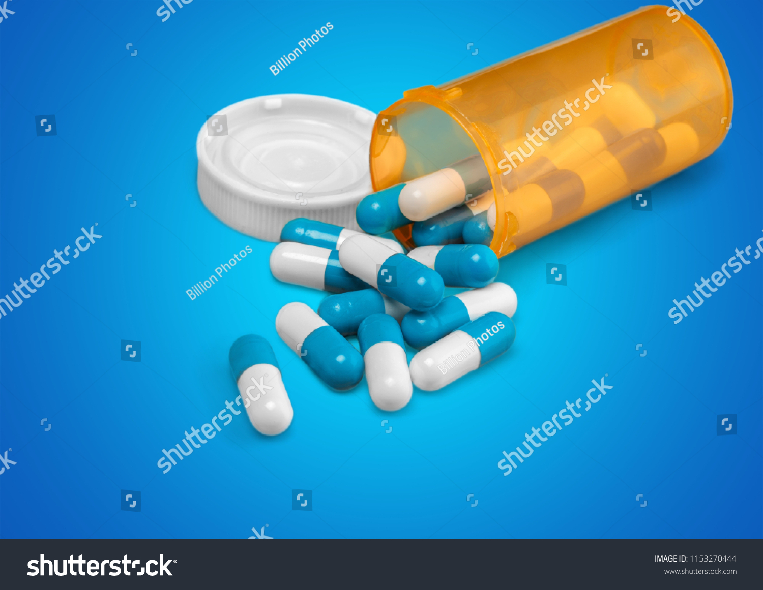 Download Blue Pills Yellow Bottle Stock Photo Edit Now 1153270444 PSD Mockup Templates