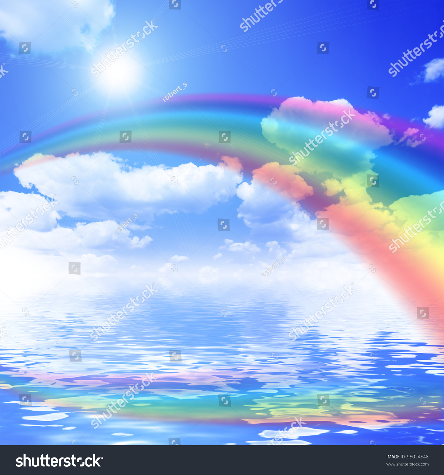 Blue Sky Background With Rainbow And Reflection In Water