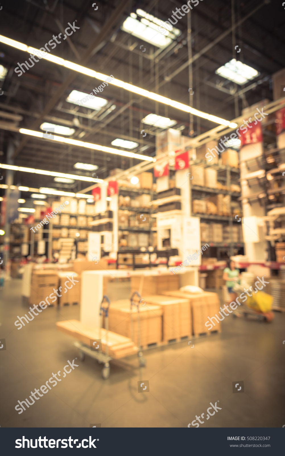 Blurred Customers Shopping Large Furniture Warehouse Stock Photo