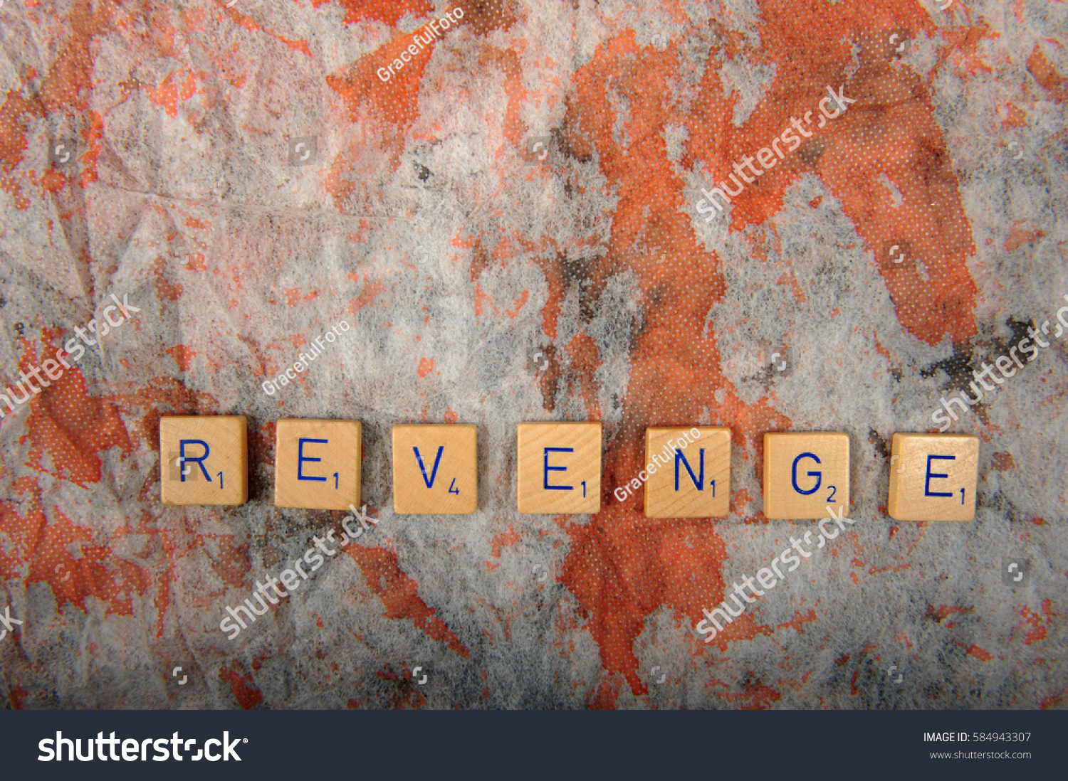 Board Game Letters Spelling The Word Revenge On Grey And Brown Speckled Cloth Sfrom Board Game Letters Spelling The Word Revenge On Grey And Brown Speckled Cloth Sfrom