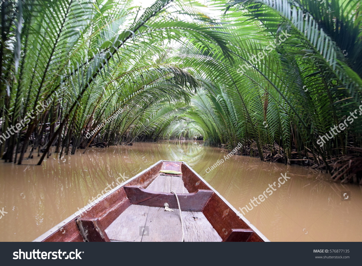 stock-photo-boat-in-a-river-in-the-jungl