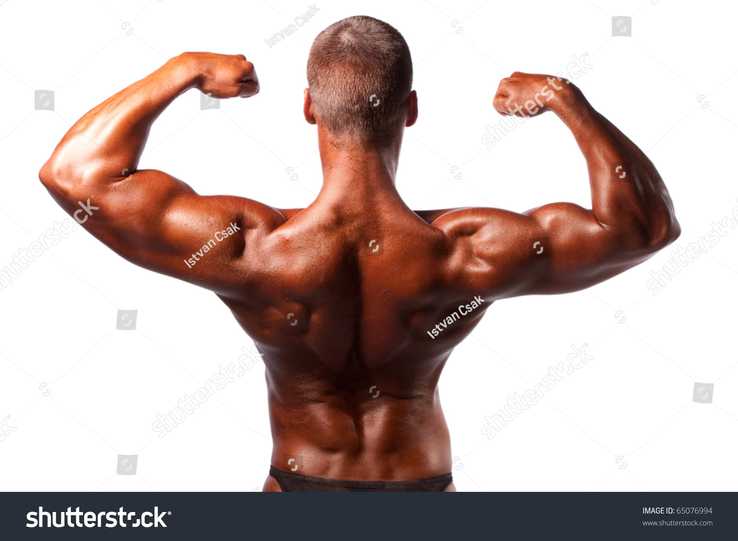 Bodybuilder Posing Over White Background Stock Photo 65076994 ...