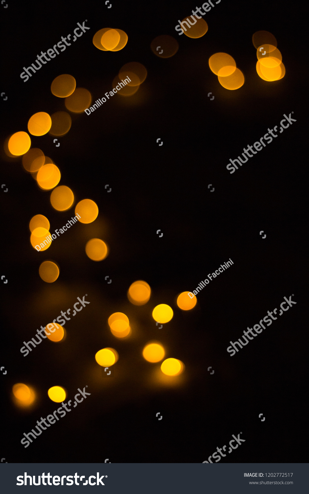 Bokeh Blurred Yellow Fairy Lights On Stock Photo Edit Now 1202772517
