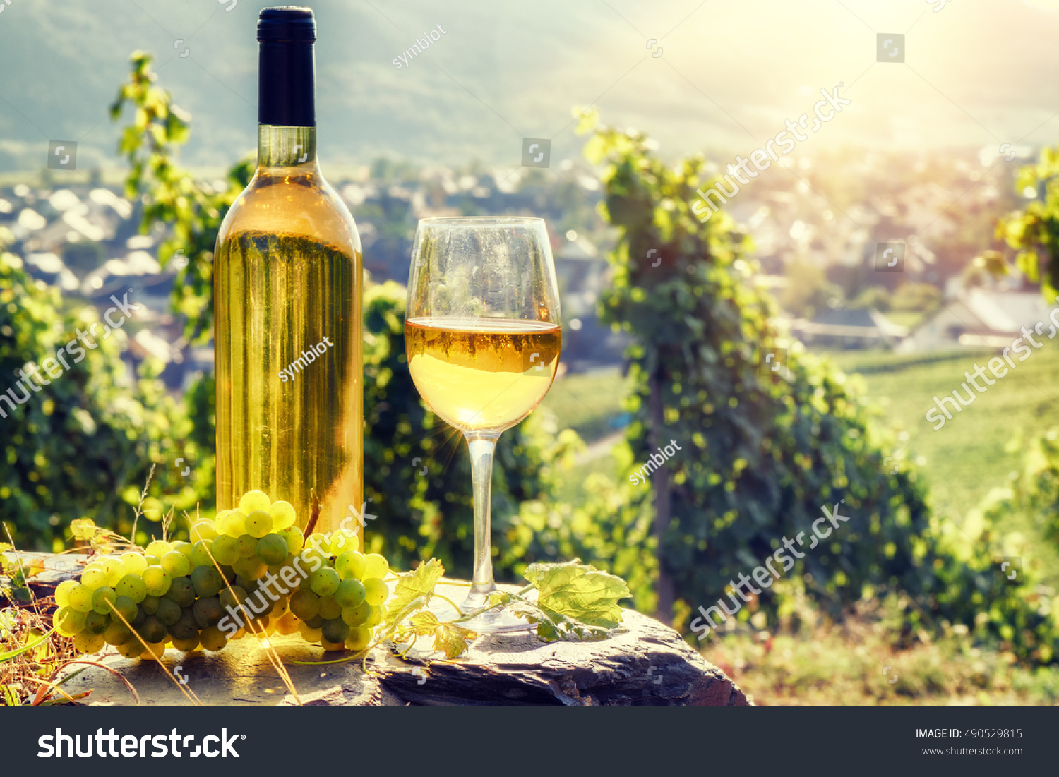 Download Bottle Full Glass White Wine Over Stock Photo Edit Now 490529815 PSD Mockup Templates