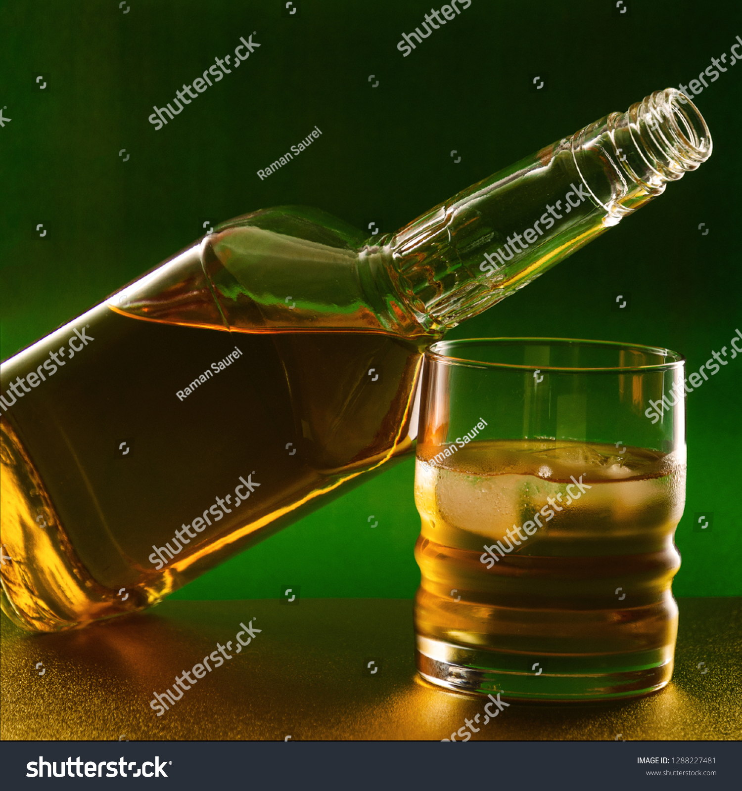 Download Bottle Glass Whiskey On Green Golden Stock Photo Edit Now 1288227481 Yellowimages Mockups