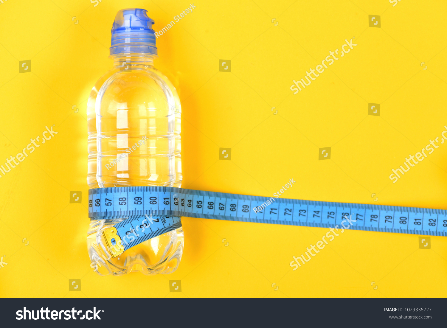 Download Bottle Water Fitness Equipment On Yellow Stock Photo Edit Now 1029336727 PSD Mockup Templates
