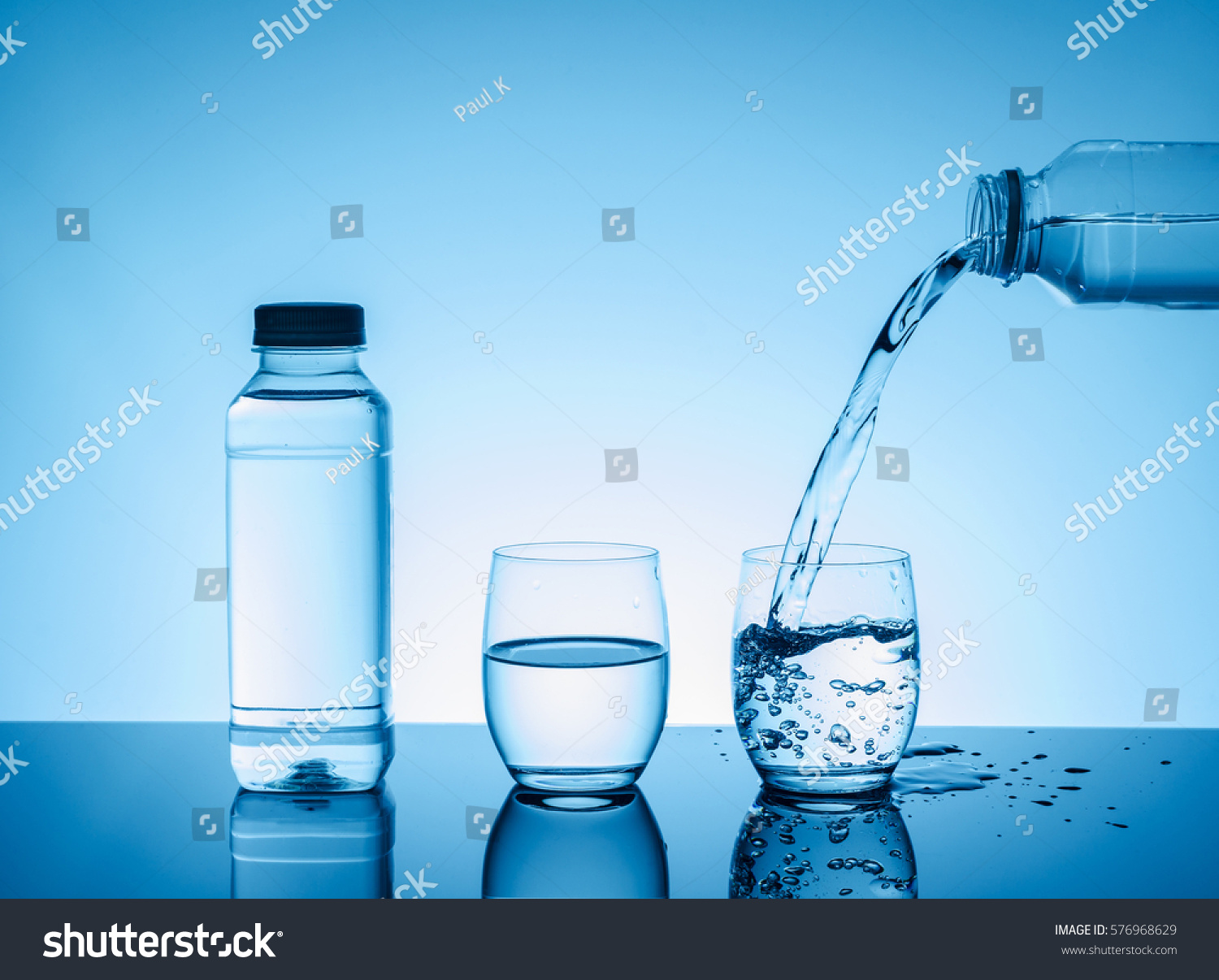 Bottle Creative Splashing Water Glass On Stock Photo (Edit Now) 576968629