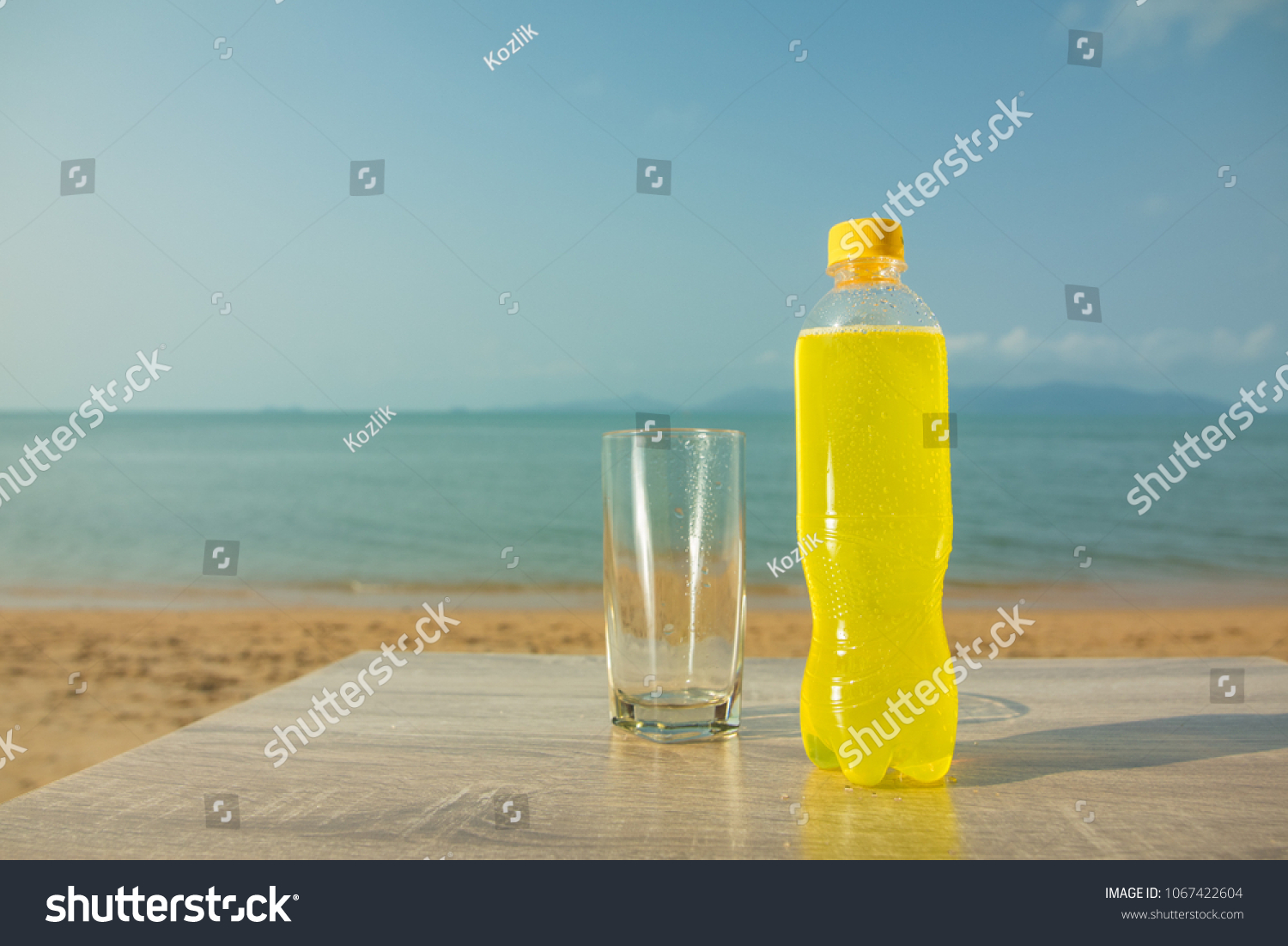 Download Bottles Multicolored Drinks Yellow Red Green Stock Photo Edit Now 1067422604 PSD Mockup Templates