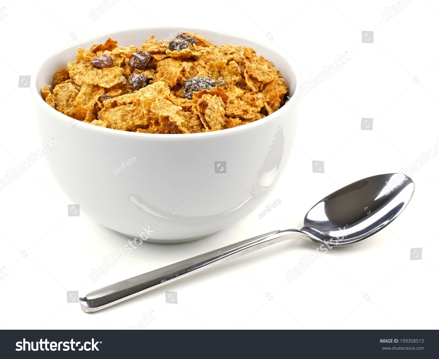 Bowl Of Bran Flakes And Raisin Cereal On A White Background With Spoon ...