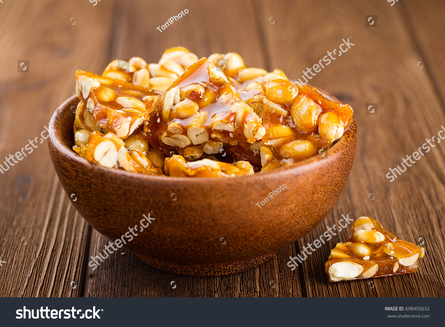 https://www.shutterstock.com/image-photo/bowl-homemade-kozinaki-made-peanuts-sugar-698450632