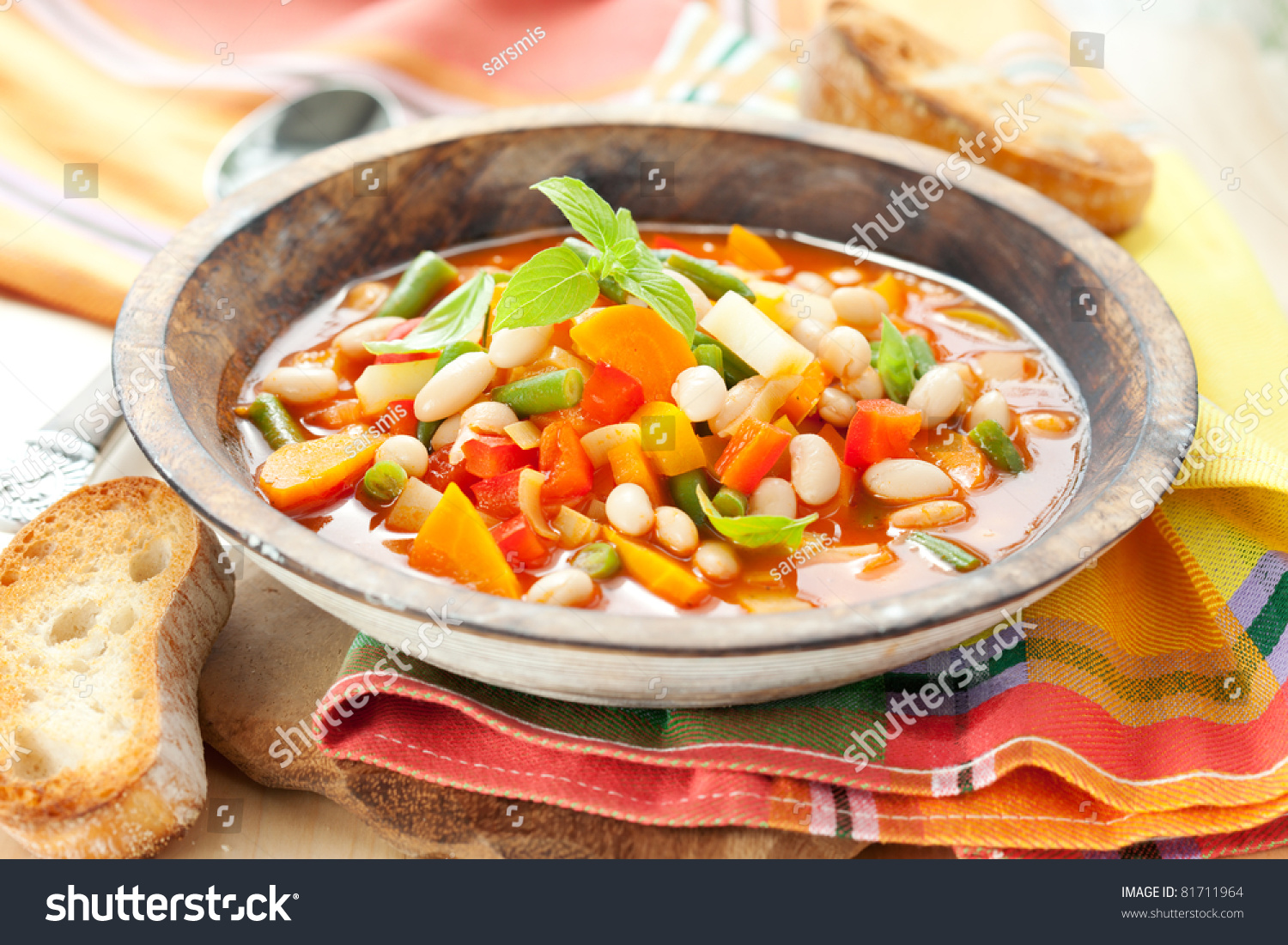 http://image.shutterstock.com/z/stock-photo-bowl-of-minestrone-soup-with-bread-81711964.jpg