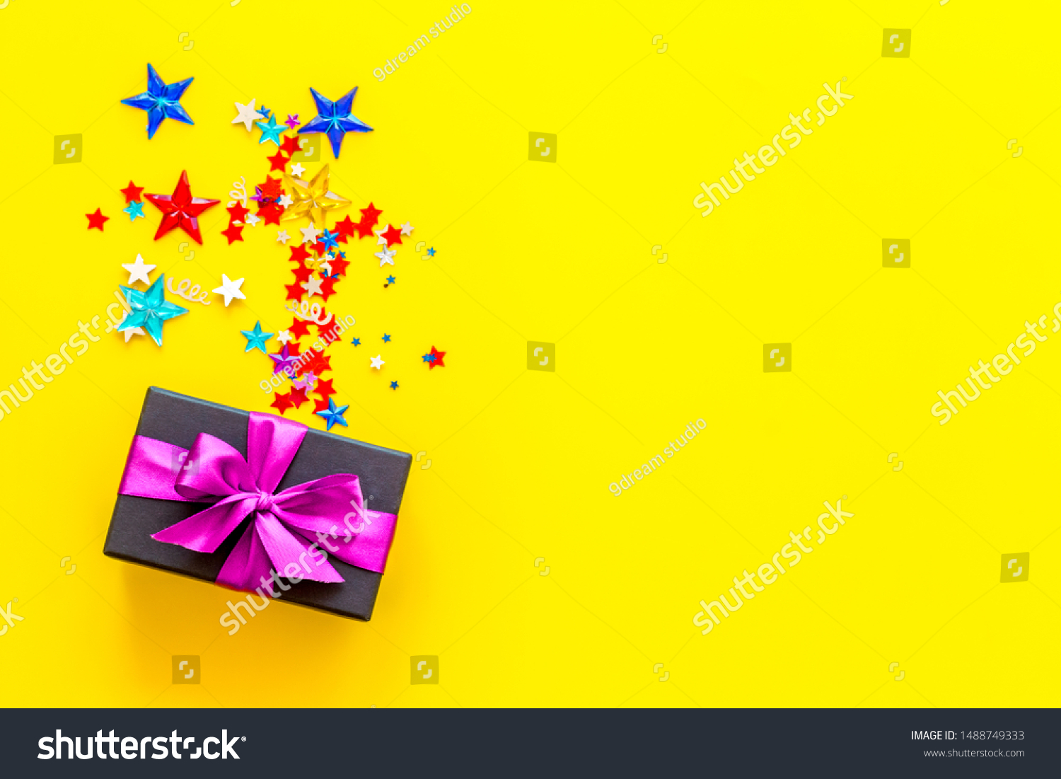 Download Box Gifts Confetti On Yellow Background Stock Photo Edit Now 1488749333