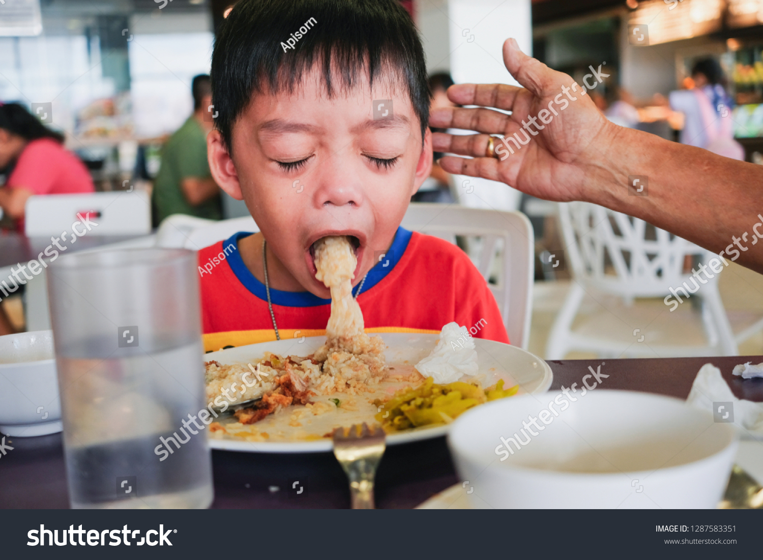 boy-puking-on-plate-after-eating-stock-photo-1287583351-shutterstock