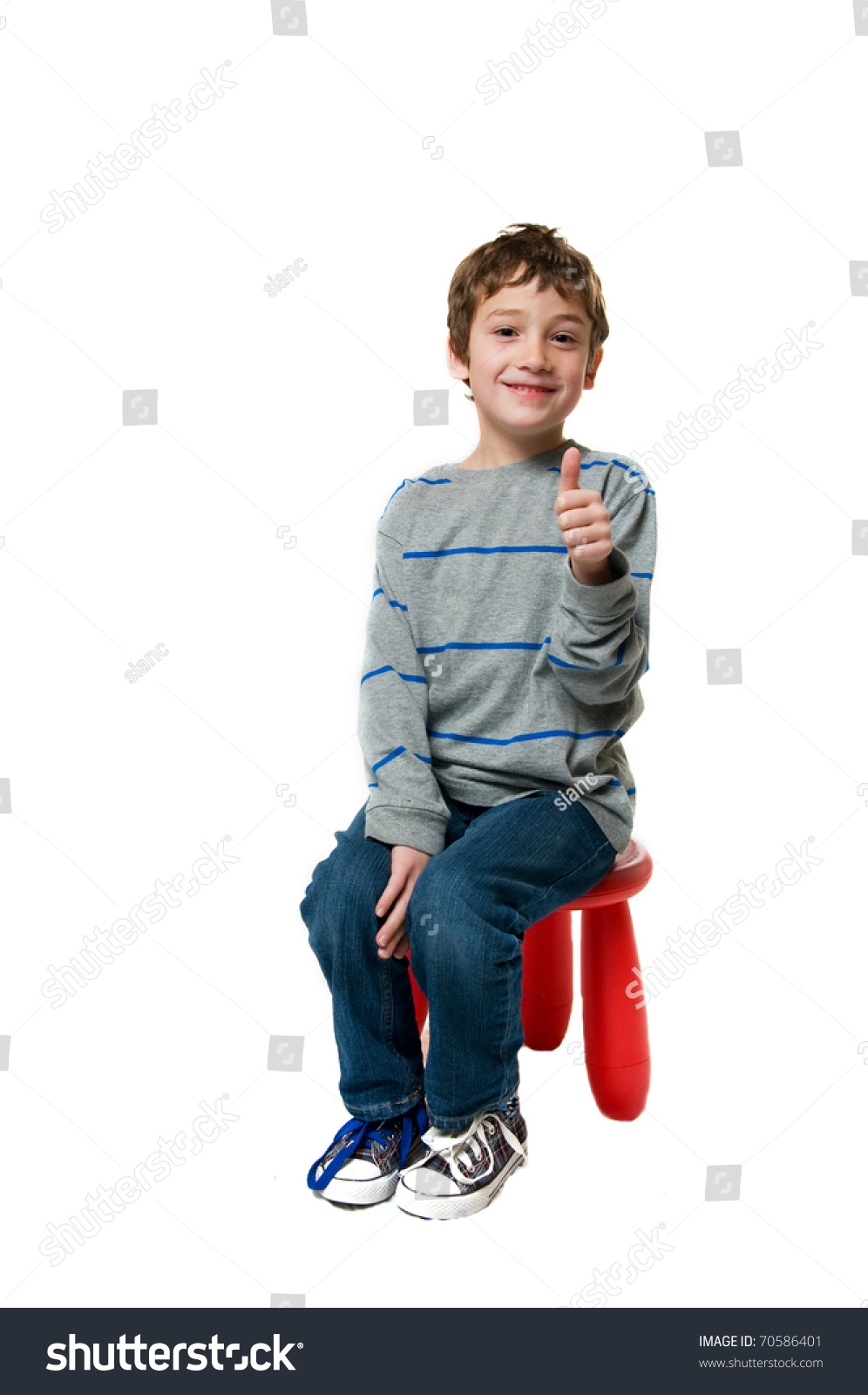 Boy Sitting On A Stool Giving A Thumbs Up Stock Photo 70586401 ...