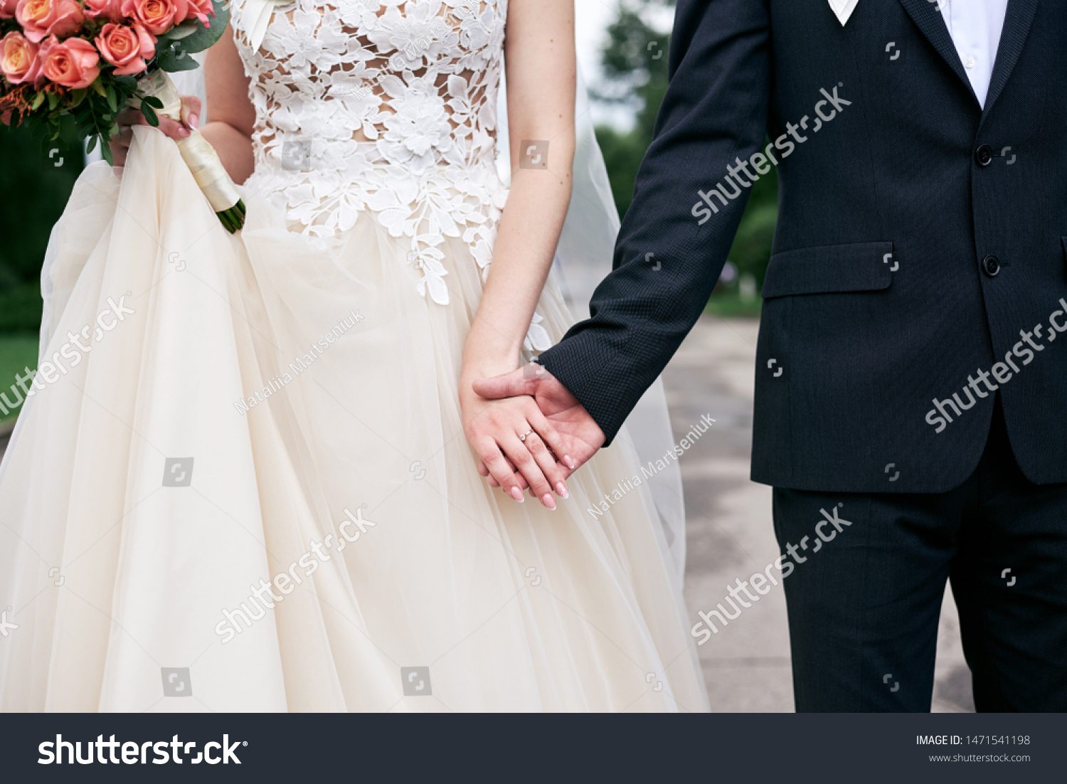 ivory wedding dress with groom