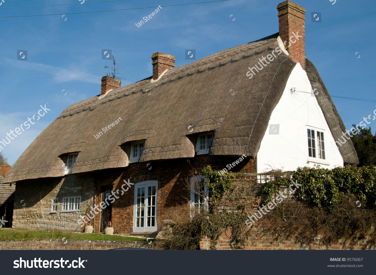 British Cottage Style Thatched House Blue Stock Photo Edit Now