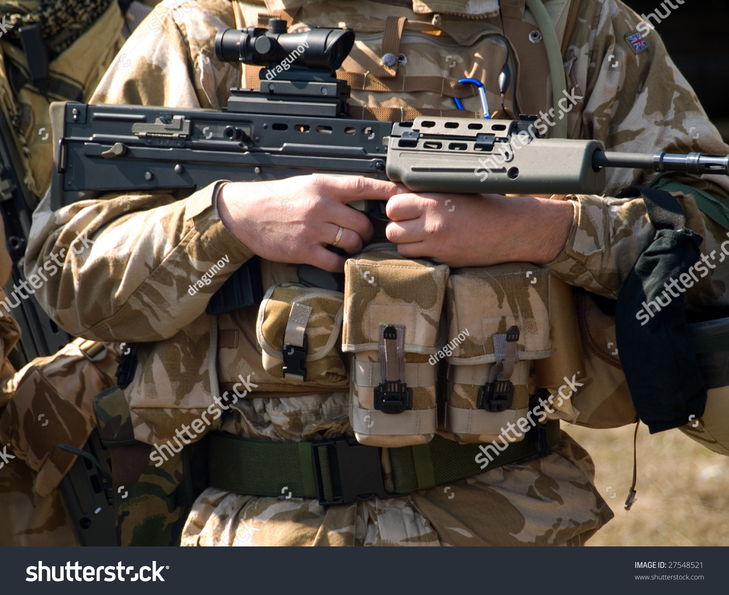 British Royal Commando In Desert Camouflage Holding His Rifle Stock ...