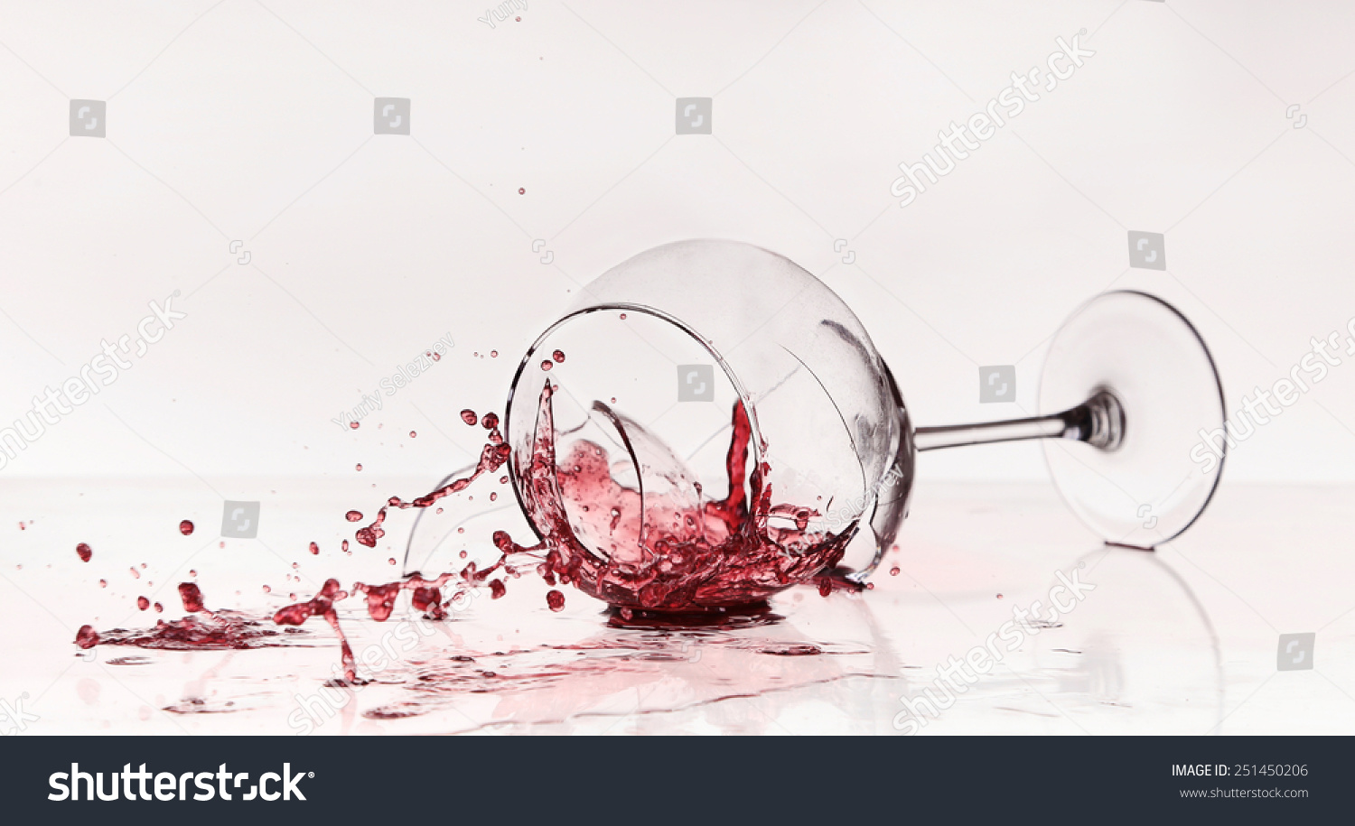 Broken Wineglass On The Table. Poured Red Wine, Like Blood. Stock Photo ...