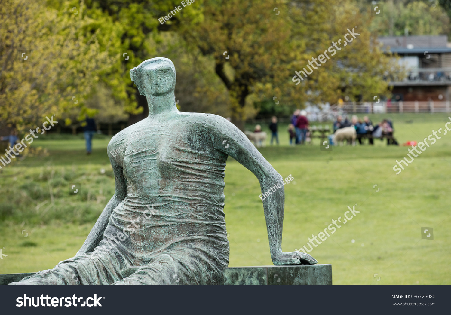 Bronze Sculpture Draped Seated Woman By Stock Photo Edit Now