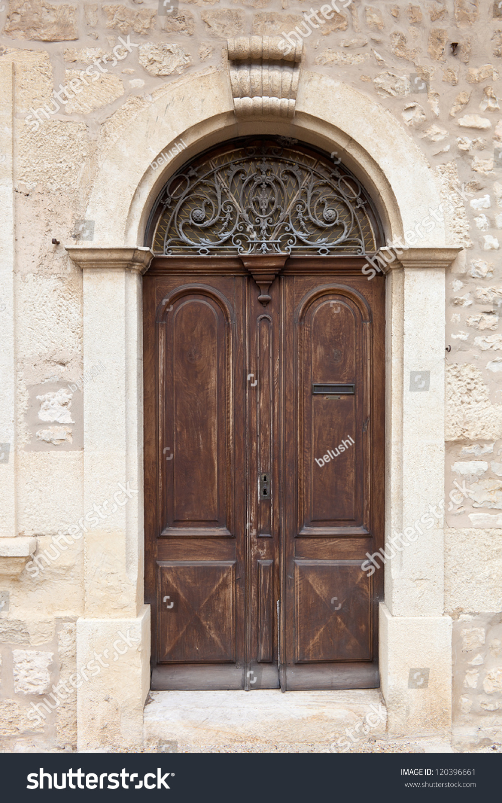 Brown Aged Rounded Door Of A An Old Mansion, France Stock Photo ...
