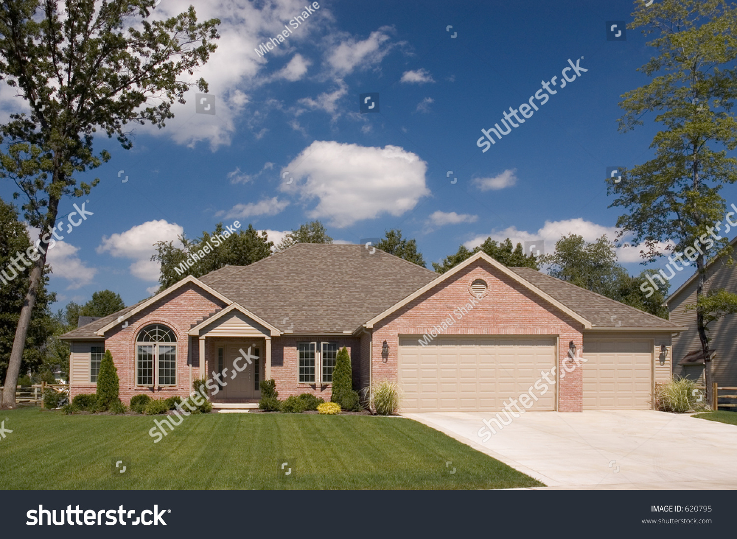 Brown Brick Ranch Three Car Garage Stock Image Download Now