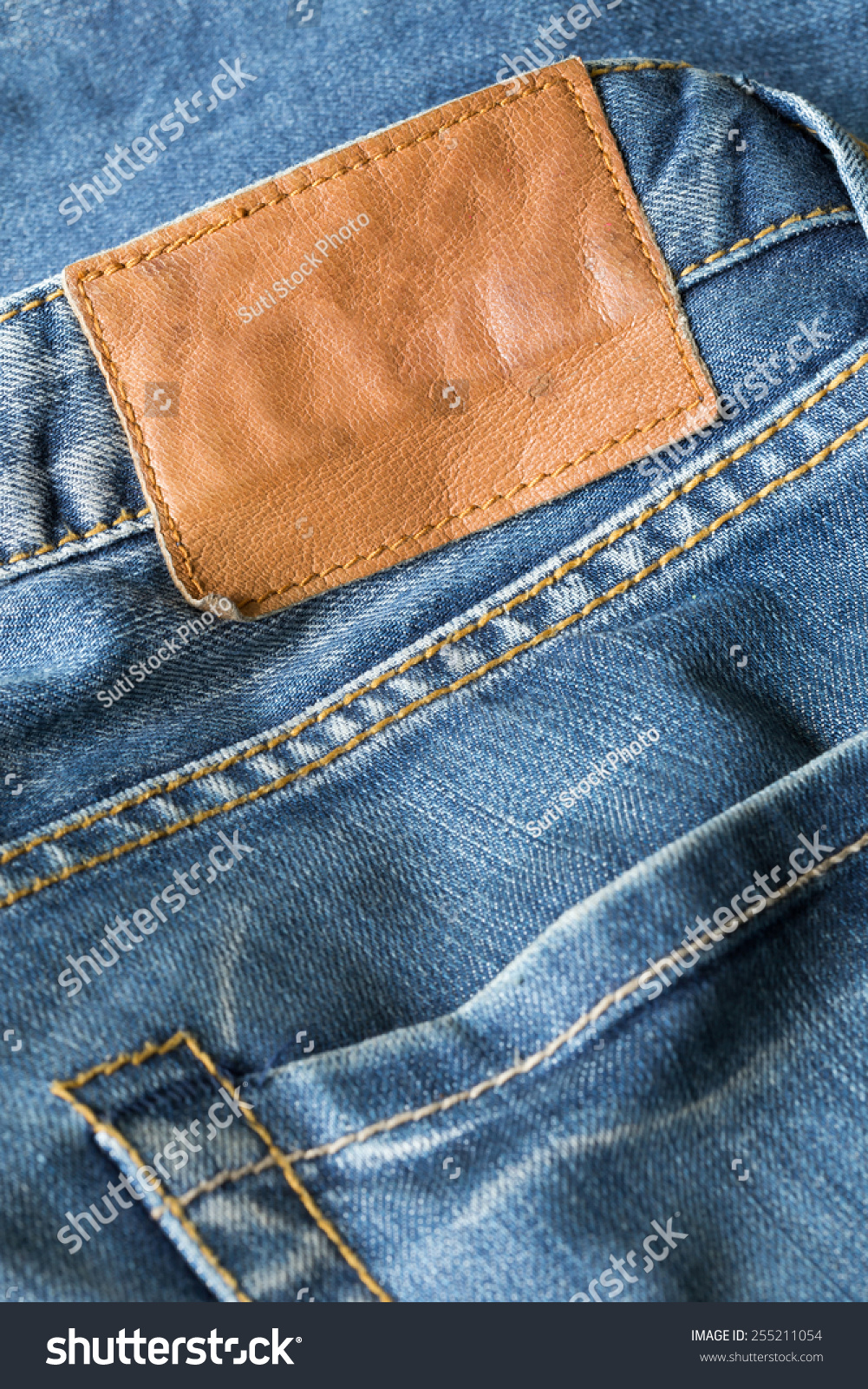 Brown Leather Tag On Blue Jeans Stock Photo 255211054 | Shutterstock