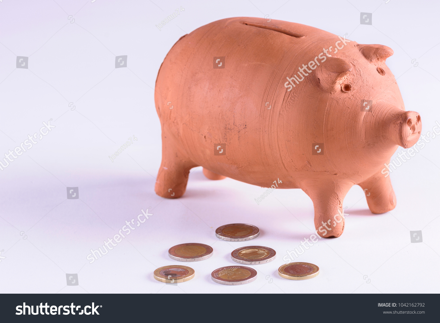 Brown Mud Piggy Bank Six Euro Stock 