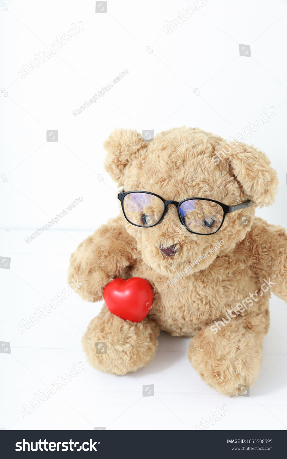 teddy bear wearing glasses