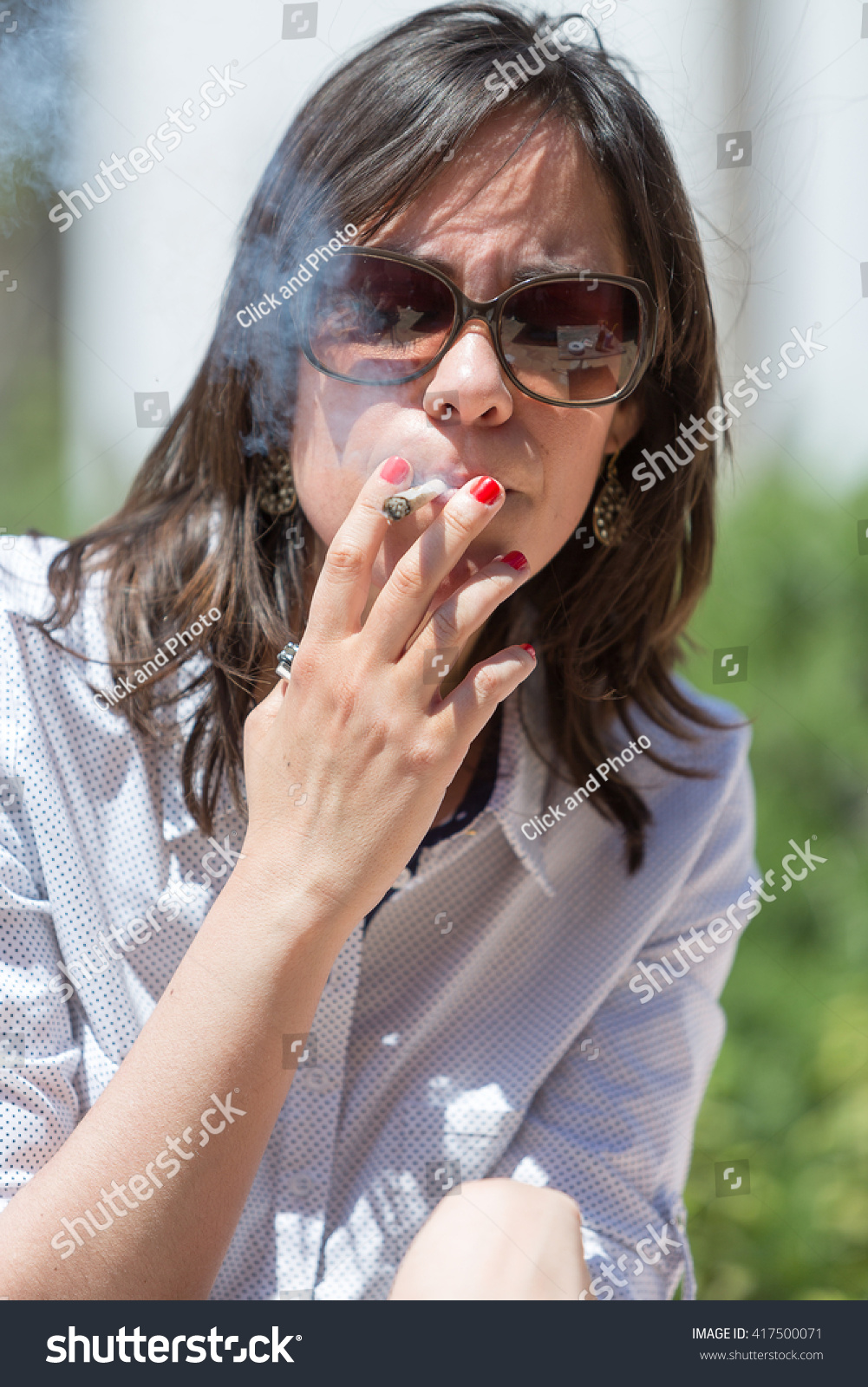 Brunette Smoking