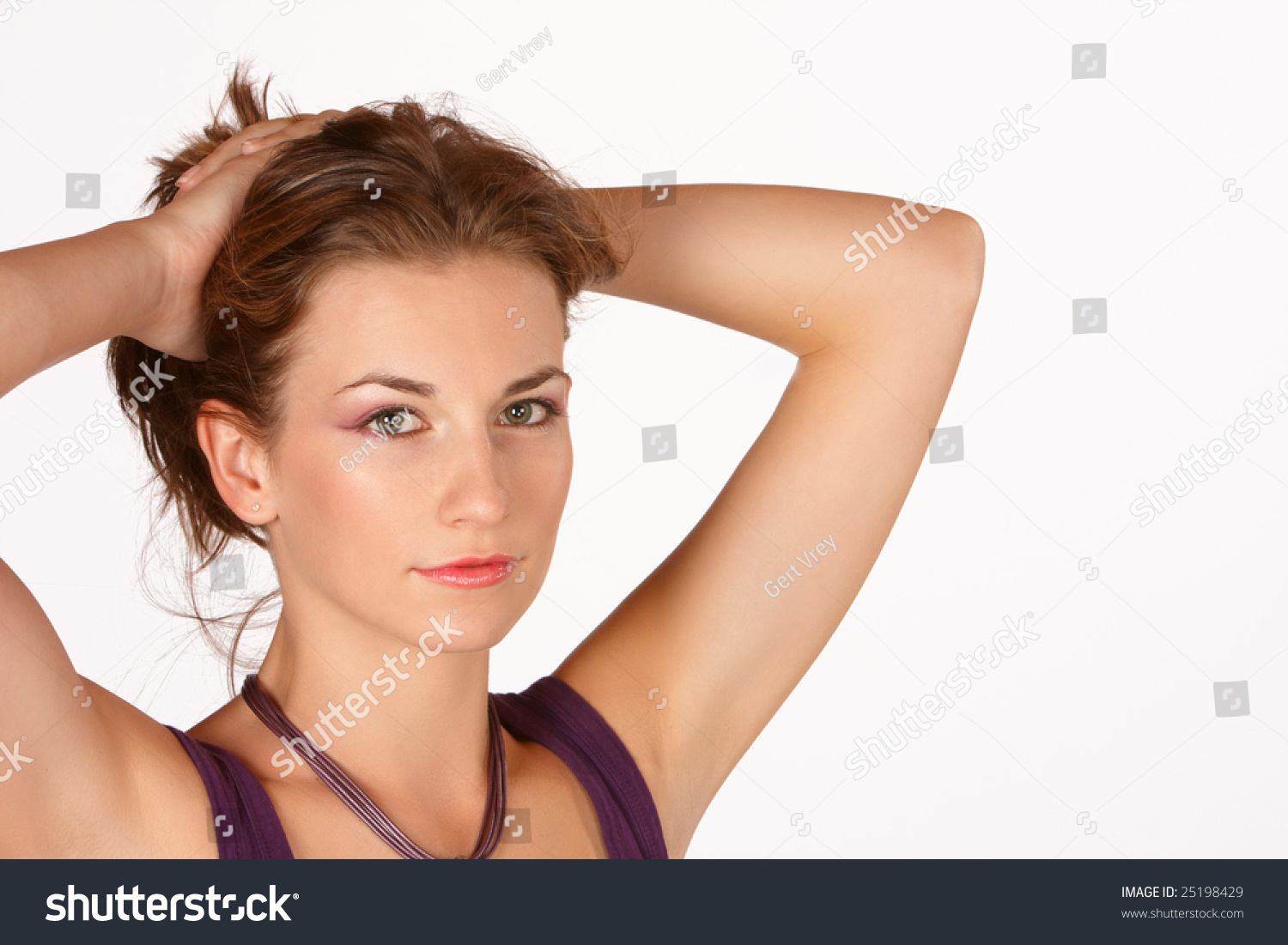 brunette-hand-holding-hair-above-head-stock-photo-25198429-shutterstock