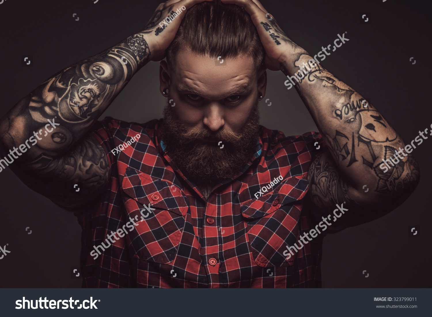 Brutal Man Beard Holding His Head Stock Photo 323799011 