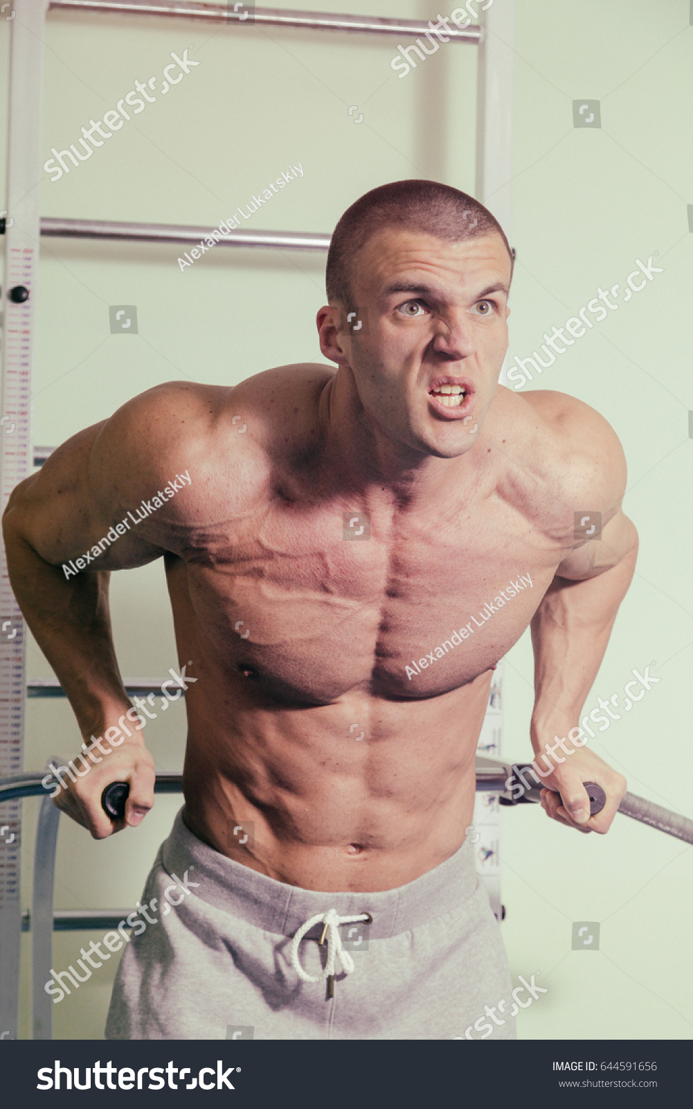 Brutal Strong Athletic Men Pumping Muscles Stock Photo Shutterstock