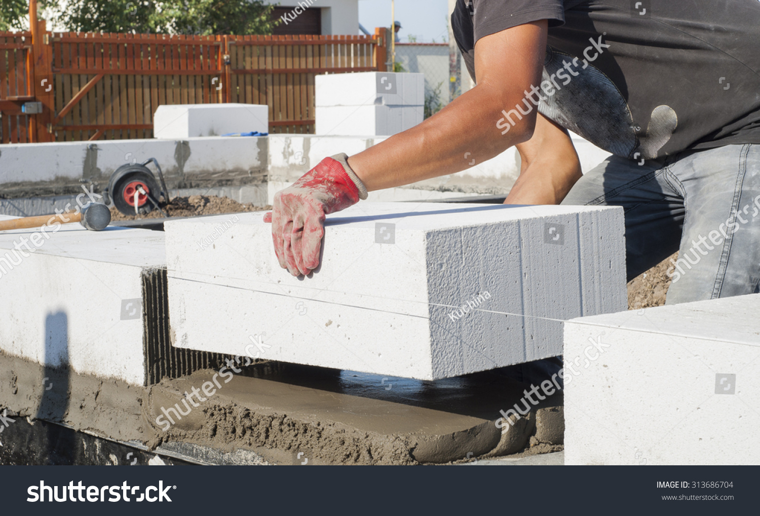 Builder Puts On Grout Aerated Concrete Block Stock Photo 313686704