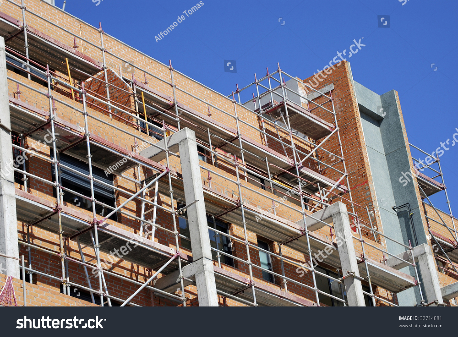 Building In Construction With Scafolds For Security Stock Photo ...