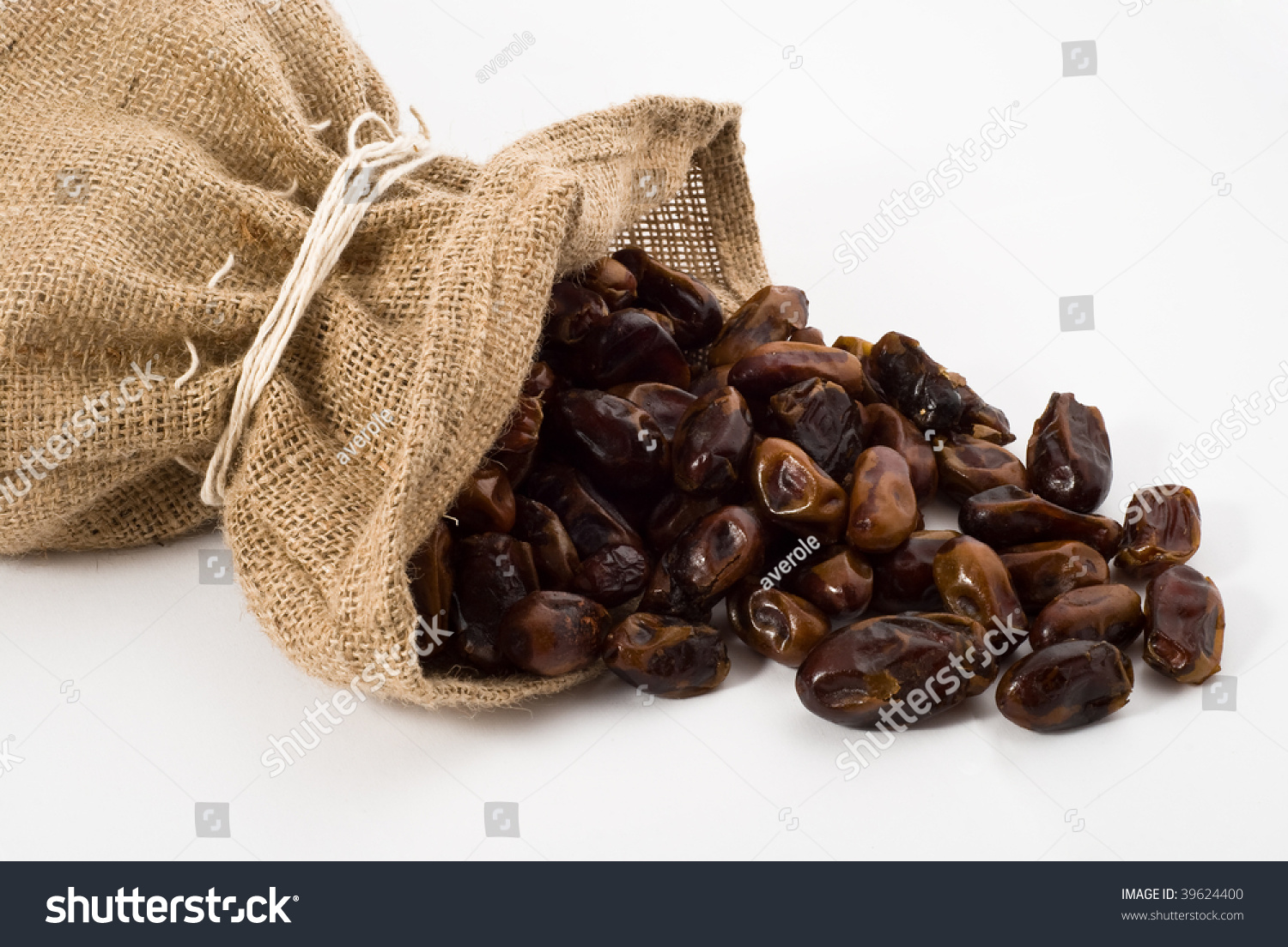 Burlap Sack With Palm Dates Spilling Out Over A White Background Stock ...