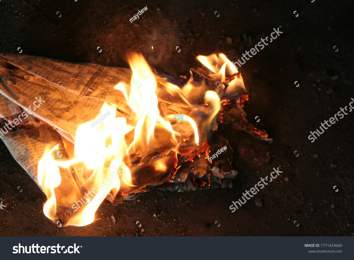 burning-newspaper-dark-space-feeling-scary-1771424660-shutterstock