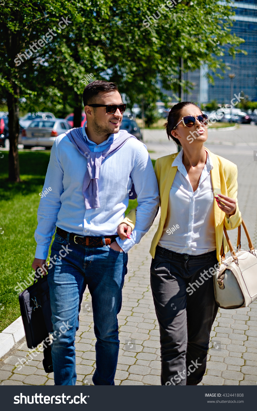 Business Couple Walking Holding Arm Under Stock Photo Edit Now