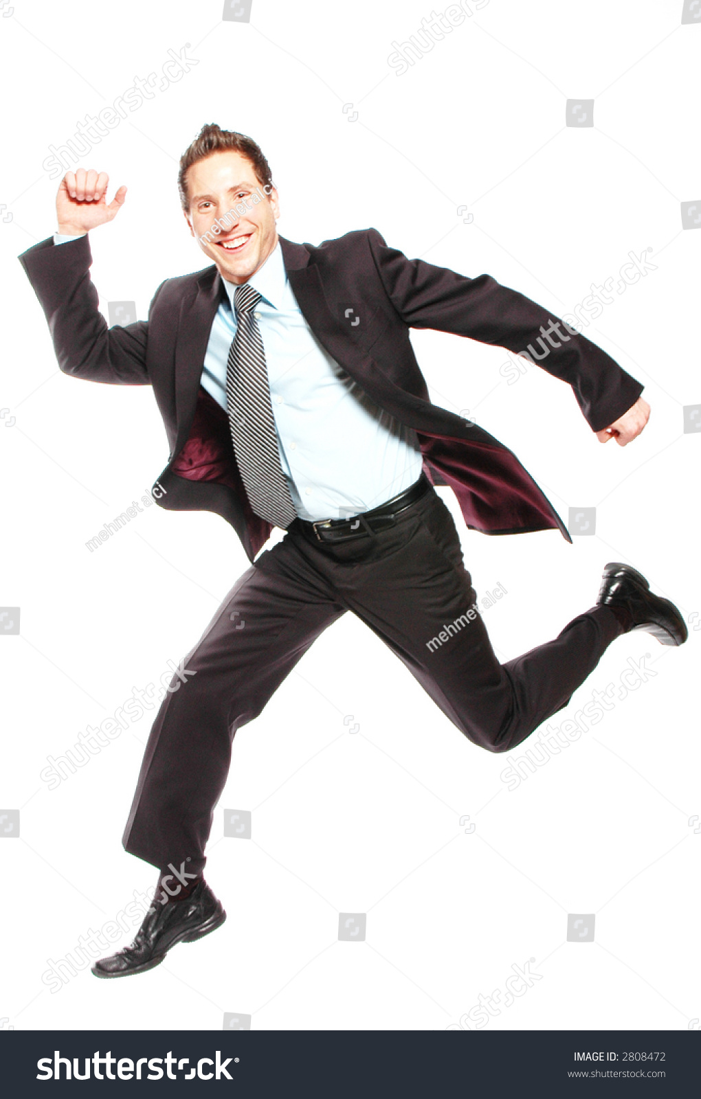 Business Man Is Jumping While Smiling, Slight Blur On Face To Depict ...