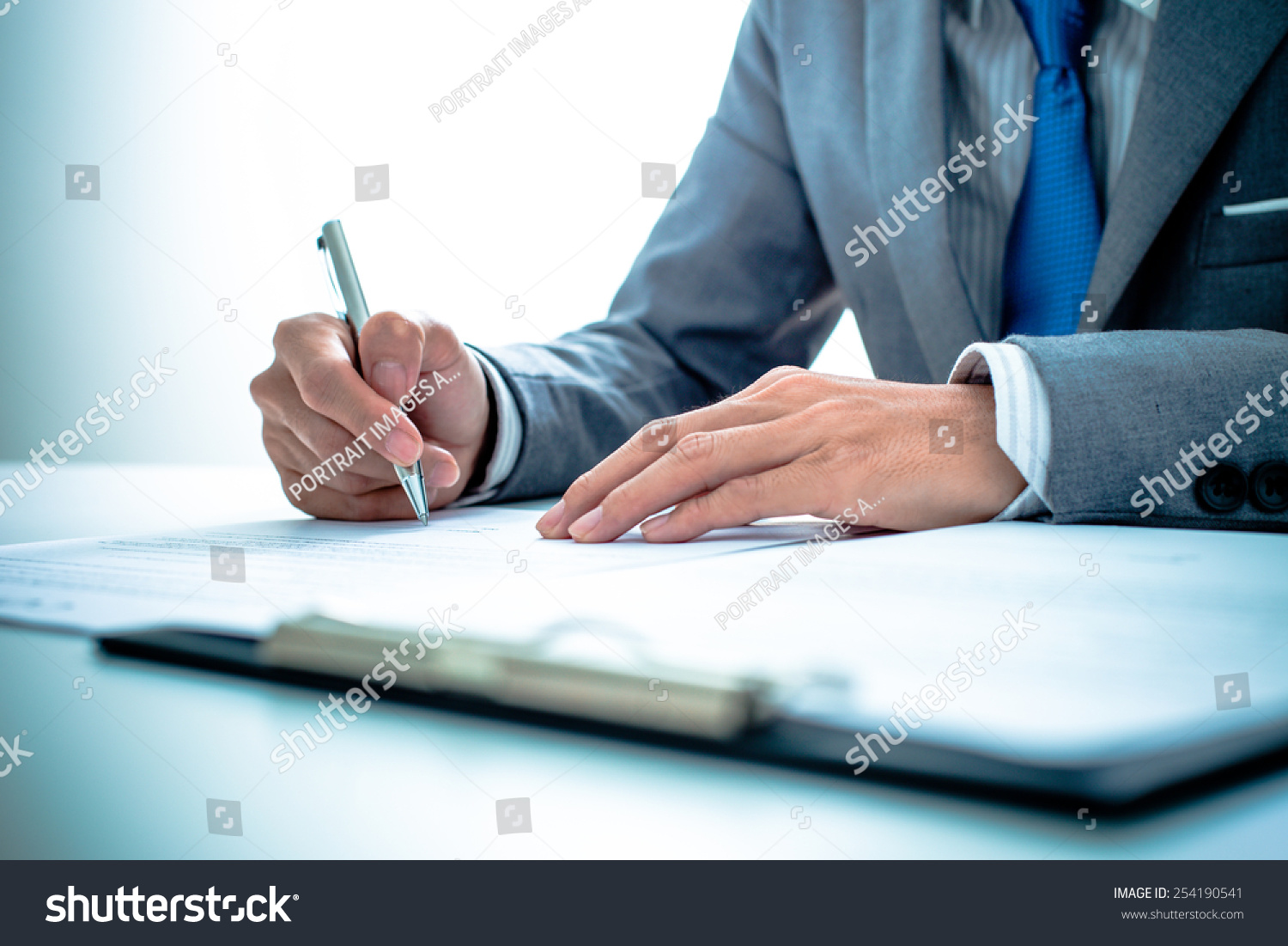 Business Man Signing A Contract Stock Photo 254190541 : Shutterstock