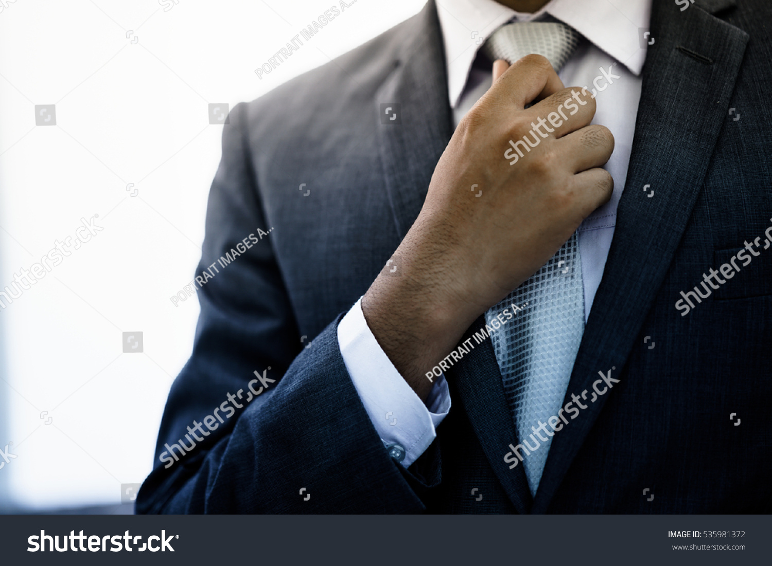 Businessman Adjust Necktie His Suit Stock Photo 535981372 : Shutterstock
