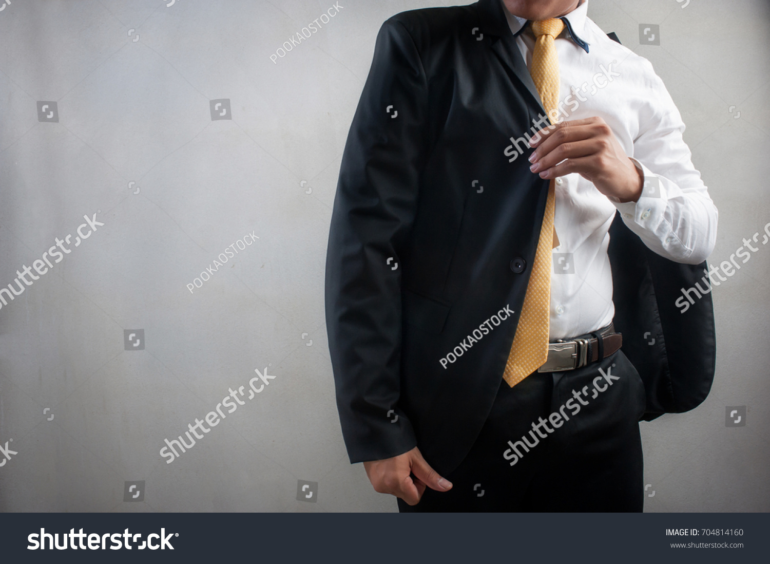 Businessman Wearing Black Suit Yellow Tie Stock Photo 704814160