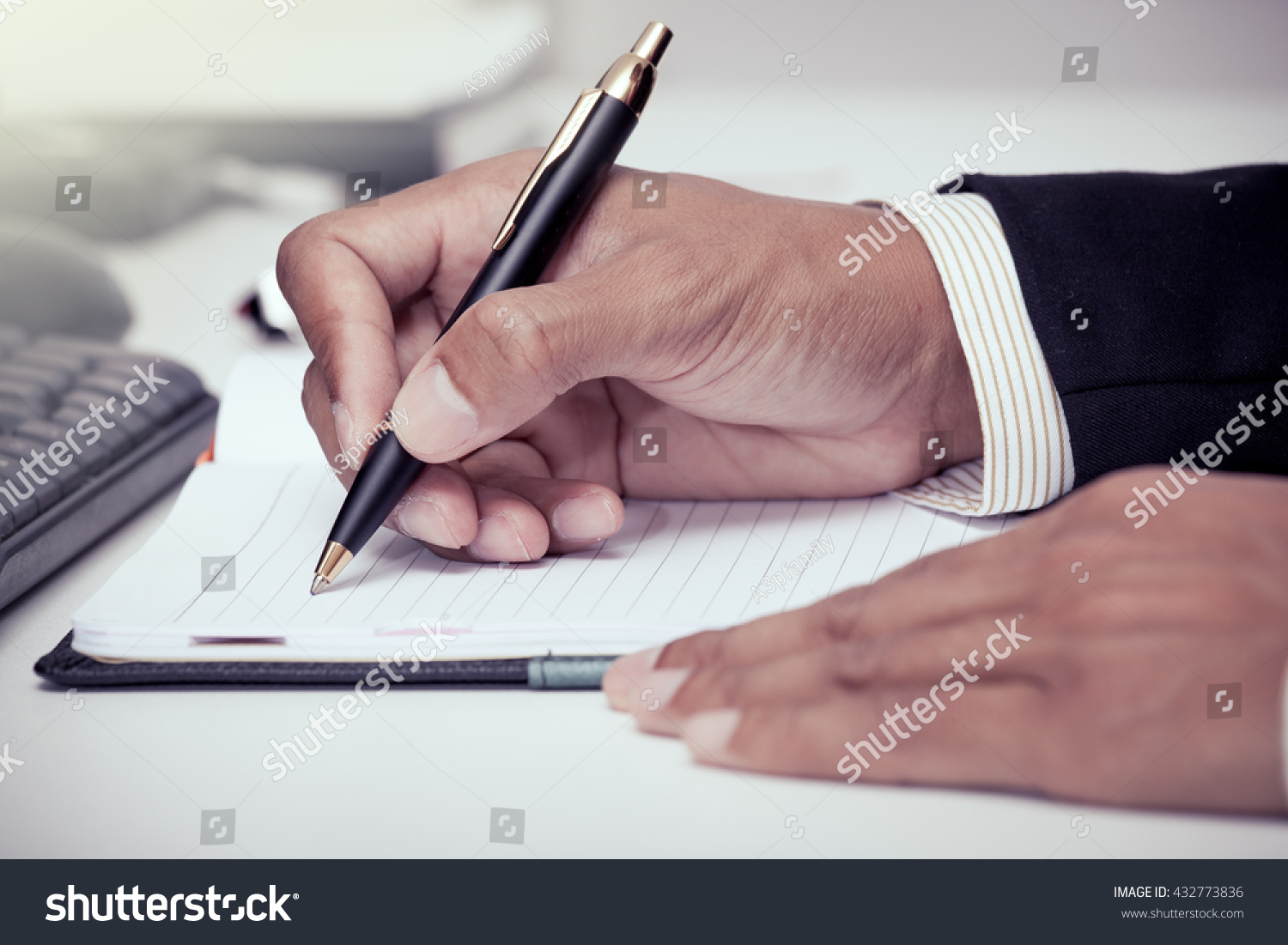 Businessman Writing On Notebook Pen Office Stock Photo 432773836 ...