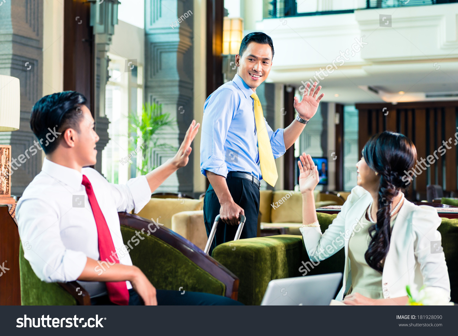 Businesspeople Saying Goodbye In A Hotel Stock Photo 181928090 ...