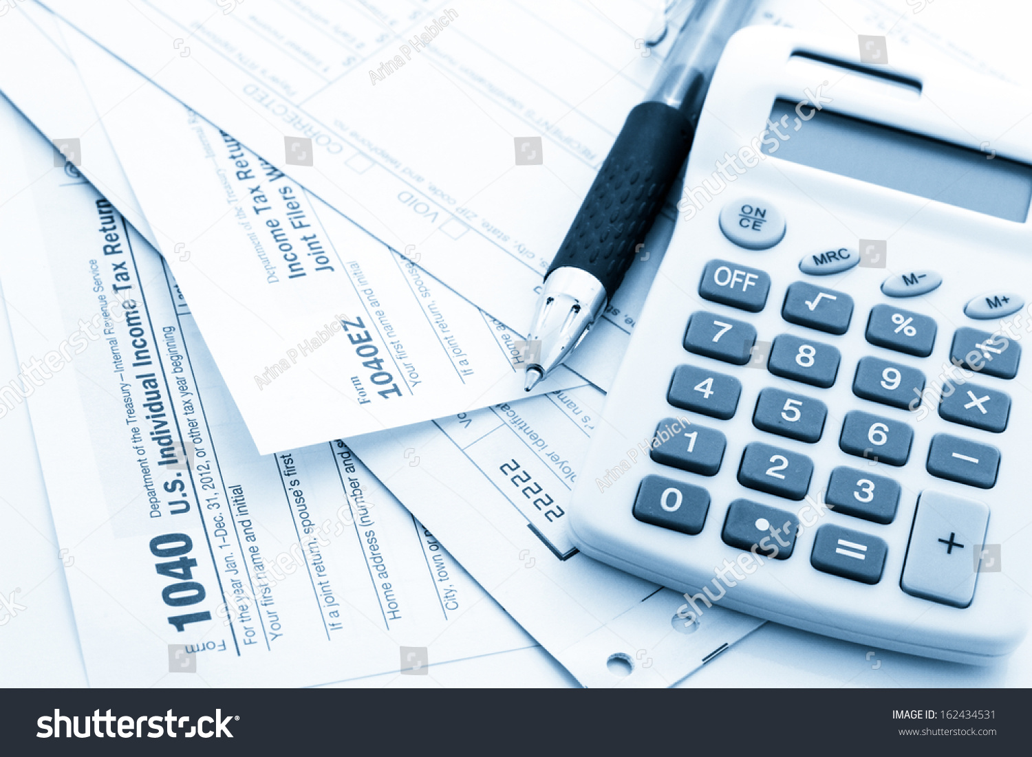 Calculating Numbers Income Tax Return Pen Stock Photo 162434531 ...